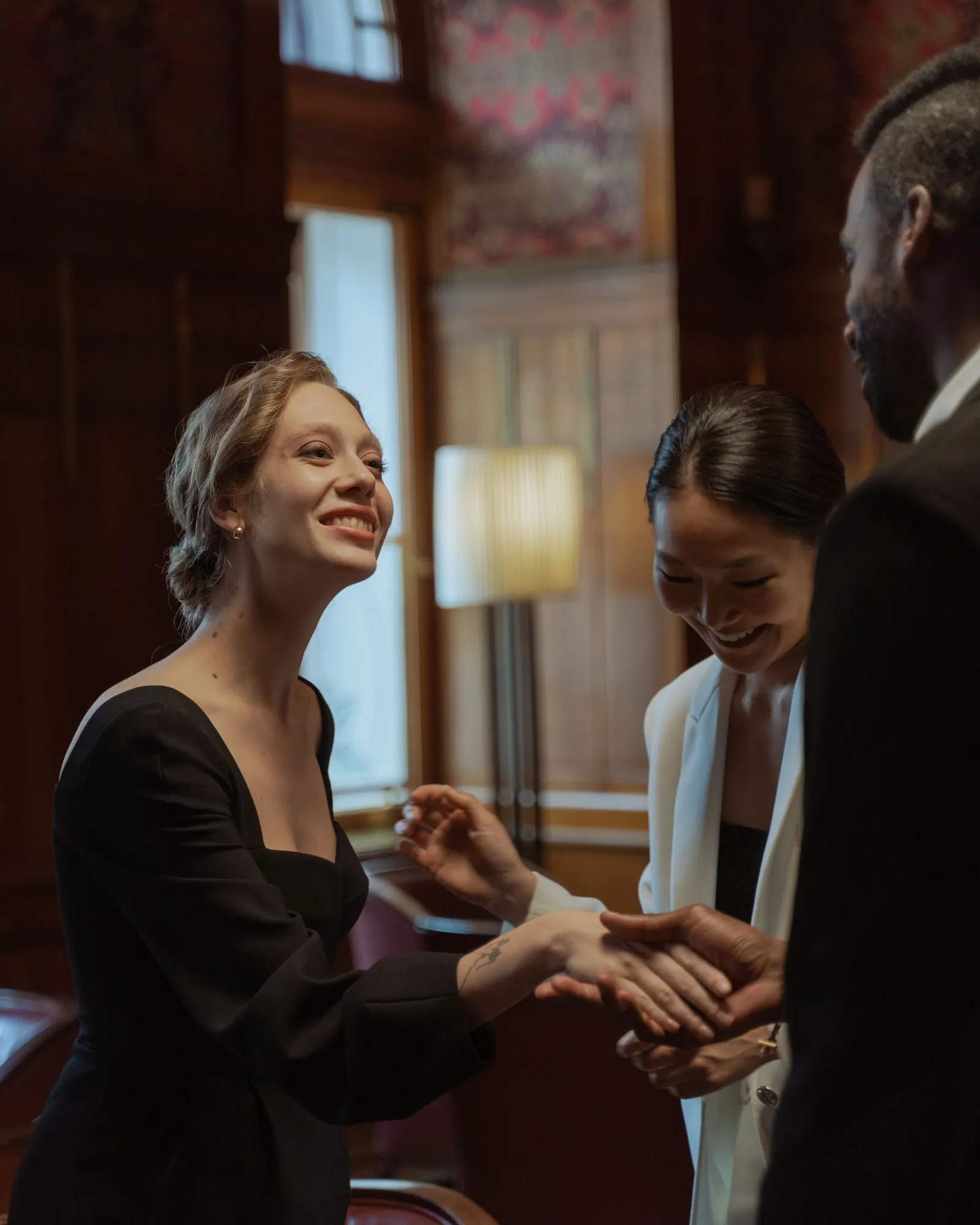 Guests greeting each other with a handshake